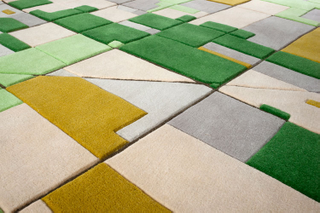 Illustration for article titled Rugs That Look Like the Earth As Seen From Your Window Seat